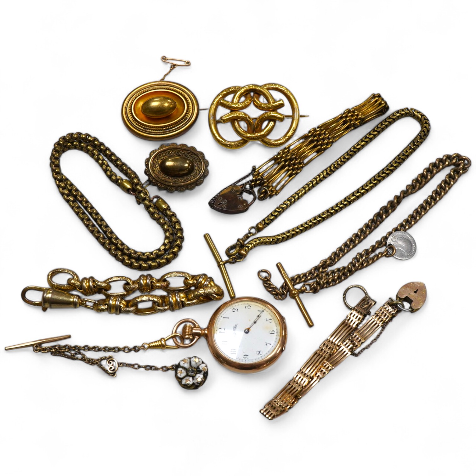 A group of gilt metal/pinchbeck jewels, 19th and early 20th century, comprising: a brooch of knotted design; two gate bracelets; a fancy link bracelet; an open-faced pocket watch; two oval panel brooches, and two watch c